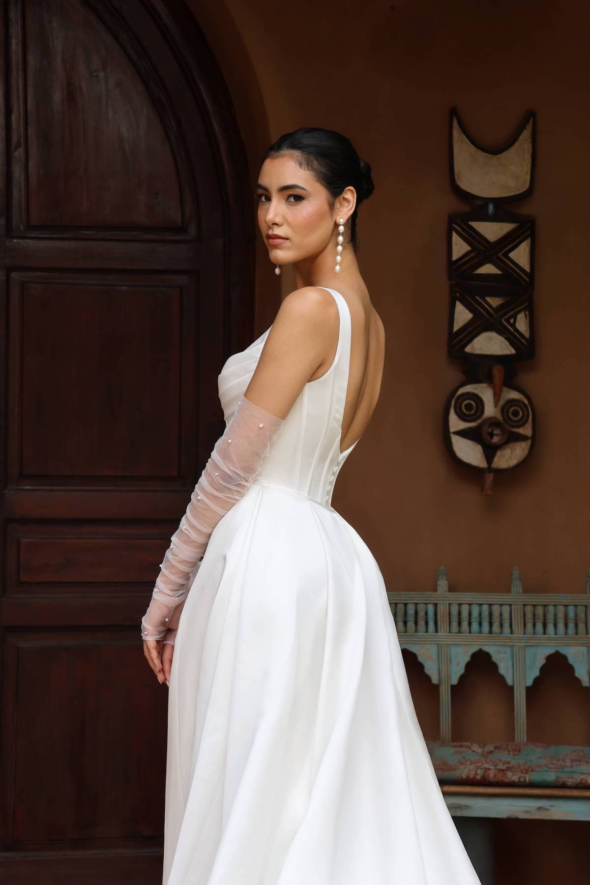 Dos de la robe de mariée sirène Sérèna avec traîne élégante, confection sur-mesure